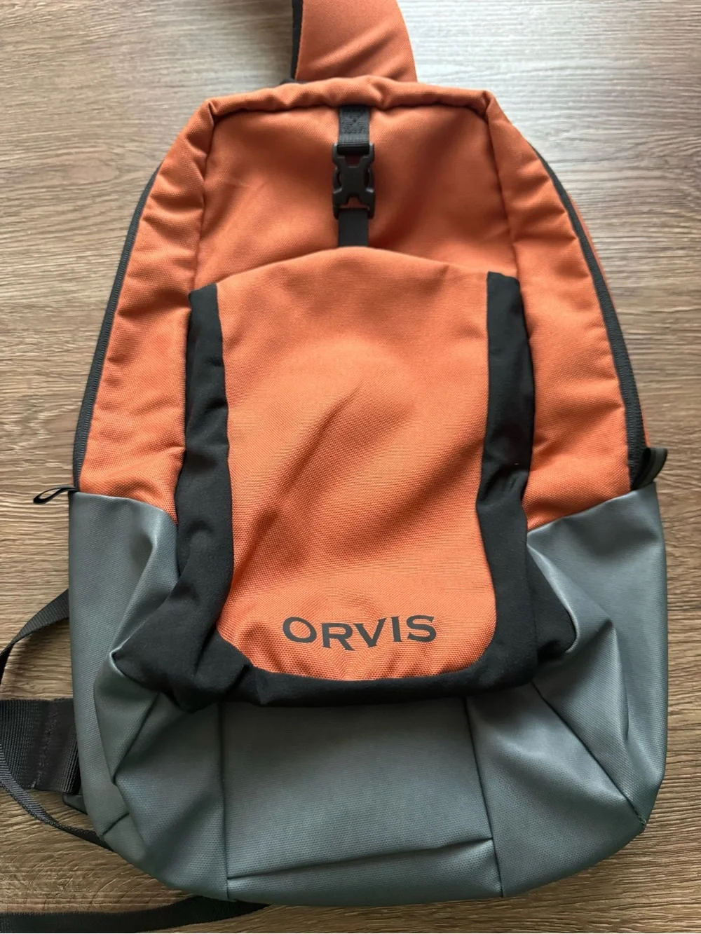 Orvis Orange and Gray Sling Backpack with Black Accents